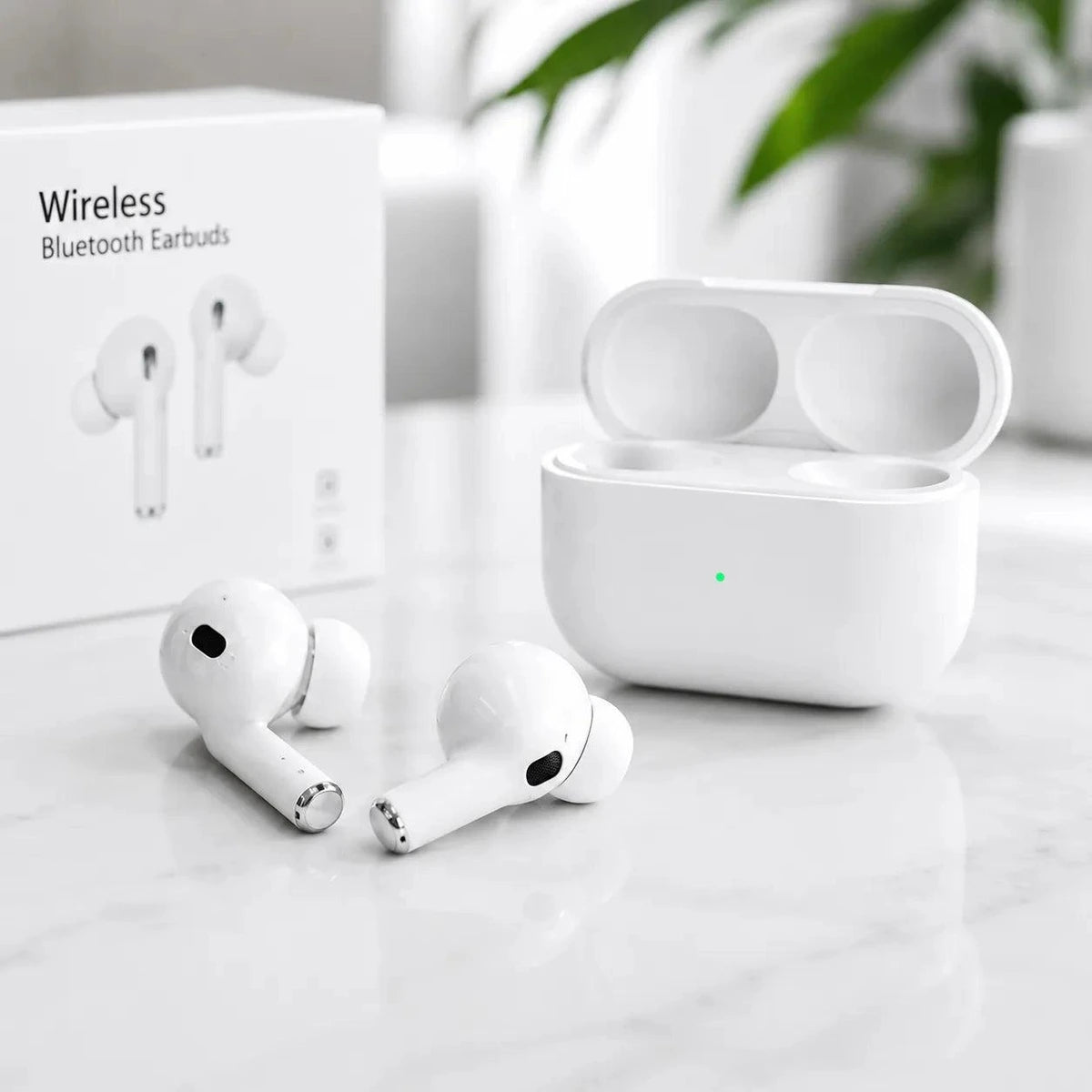 Auricolari wireless STIMA bianchi con custodia di ricarica aperta su piano in marmo